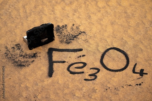Iron oxide, Fe3O4 collected from sand with magnets, Namib desert near Walvis Bay, Namibia