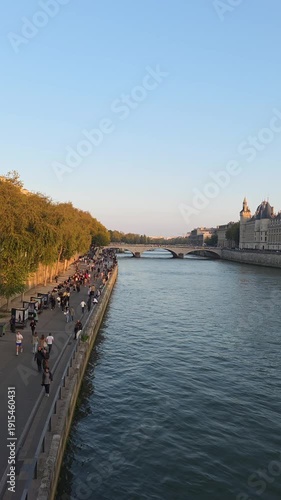 Paris, France - 12 October 2025 - Seine River View from Riverside Promenade in Paris at Golden Hour – Vertical Video