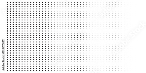 Abstract pattern of dots fading from black to white.