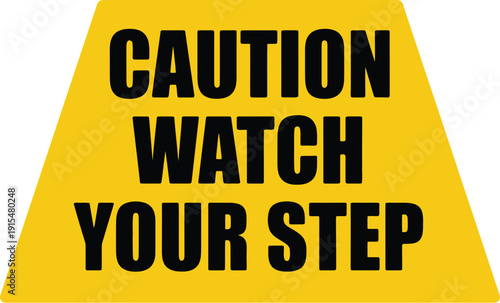 A yellow caution sign with black text warning people to watch their step