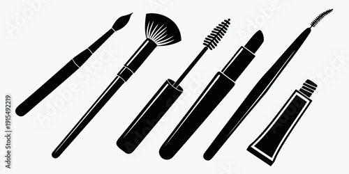 A variety of makeup brushes and tools laid out on a white background Vector