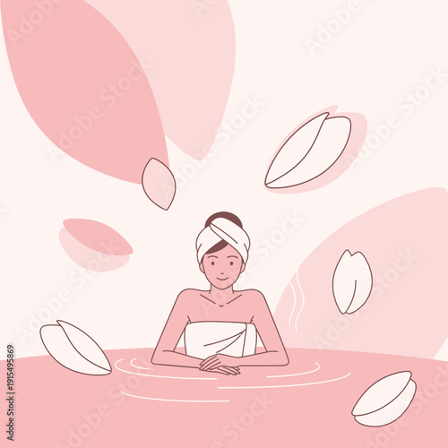 Serene Woman Enjoying A Relaxing Bath Surrounded By Soft Petals