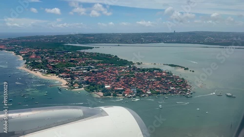 Plane landing in Bali Indonesia view from the window during landing