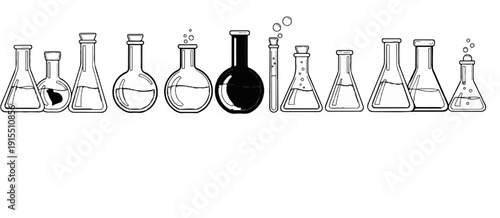 Assorted laboratory flasks and tubes with bubbling liquids and stoppers