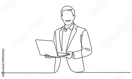 Businessman holding a laptop computer with a smile.