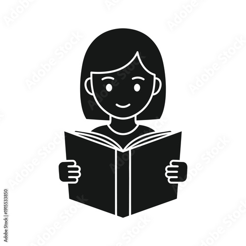 Young Girl Reading a Large Open Book for Education and Childhood Literacy Concept
