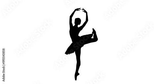 Silhouette of a graceful ballerina performing a dance pose.