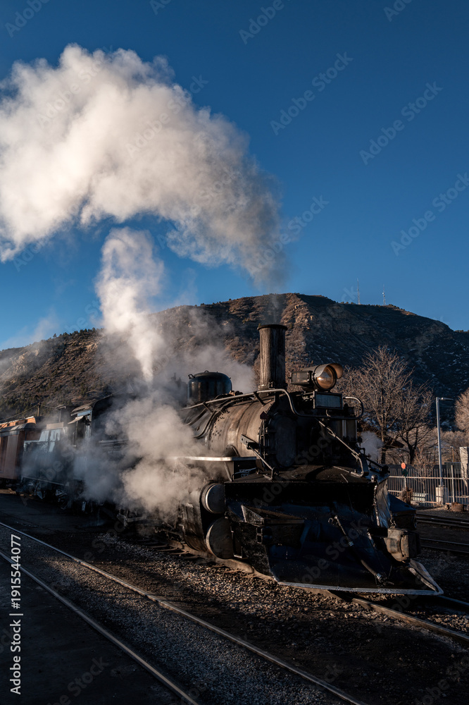 Fototapeta premium Historic train engine with head of steam