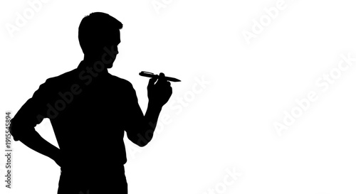 Silhouette of a man holding a pen in his hand.