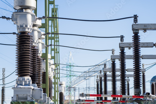 Quadro su tela High voltage substation detail with tall ceramic insulators, busbars and overhea
