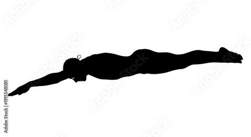 Silhouette of a swimmer in midstroke during a race.