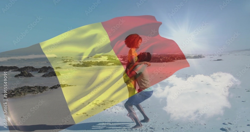 Naklejka premium Lifting couple wearing yellow one-piece and T-shirt with shorts on pale sand, flag overlay