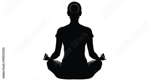 A black silhouette of a person meditating in a seated lotus position against a stark white background conveying tranquility and inner peace