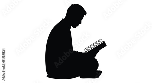 A black silhouette depicts a person seated and engrossed in reading a book showcasing a contemplative and focused moment