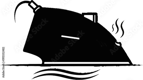 Black iron with steam rising, resting on a textured surface