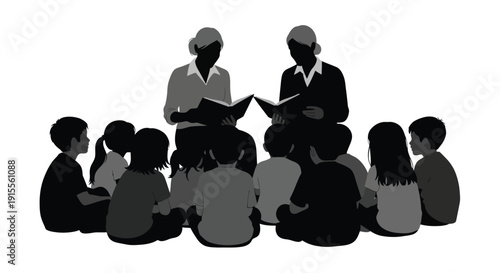 A group of children listen attentively to two adults reading aloud