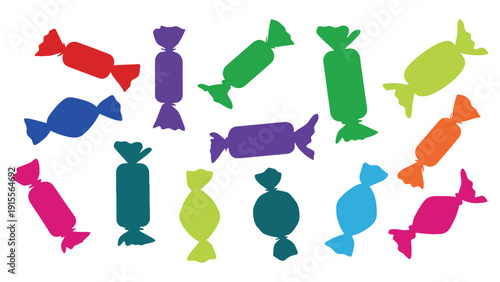 A vibrant collection of individually wrapped candies in assorted colors, scattered playfully on a white background.