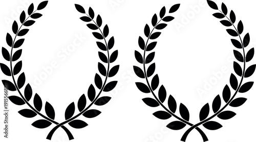 Two classic black and white laurel wreaths symbolizing victory and achievement.