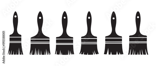 Collection of Black Paint Brushes. of Varying Sizes on White Background, Studio Shot.