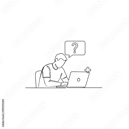 man sitting on a chair with laptop