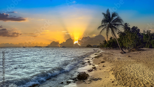 Spectacular sunset over Bayahibe public beach, Bayahibe, La Romana, Dominican Republic