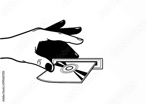 Hand inserting CD into slot