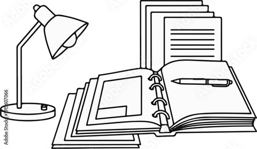 Lamp illuminating an open binder with papers and a pen