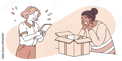 Smiling woman holds a tablet displaying positive information while another person reacts happily beside an empty cardboard shipping container.