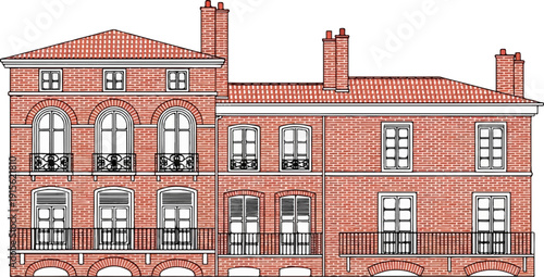 Ornate brick building facade with multiple windows and balconies