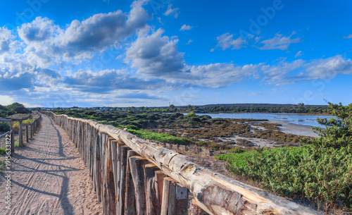 View of the Nature Reserve of Saline dei Monaci (Salt pans of Monks) located near Torre Colimena town on the Ionian coastline of Puglia Region, Italy.