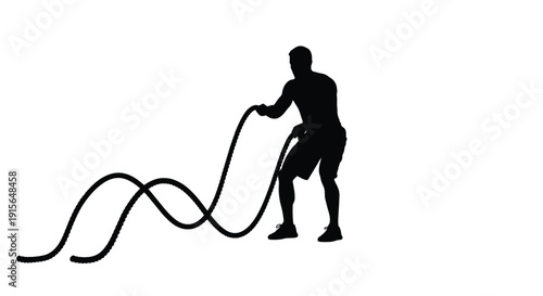 Athlete pulling a rope in a dynamic stark silhouette