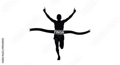 Runner crossing the finish line in a dramatic silhouette