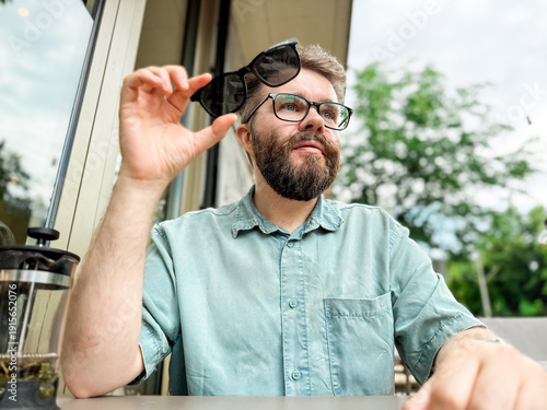 Tableau sur toile Glasses with magnetic clip on sunglasses