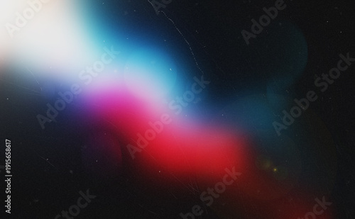Abstract grainy gradient background with vibrant blue pink and red light leak effects
