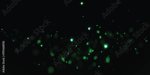 Abstract green particle background with shimmering lights and bokeh effect
