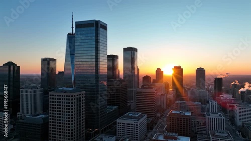 Downtown cityscape with majestic skyscrapers and vibrant sunrise creating a stunning urban landscape scenery beauty at morning time
