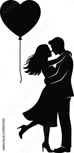 Silhouette of a loving couple embracing with a heart shaped balloon.