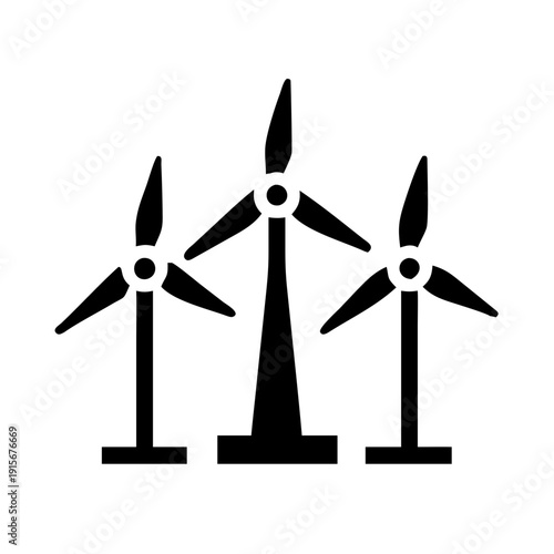 Three wind turbines harnessing clean energy in an open field