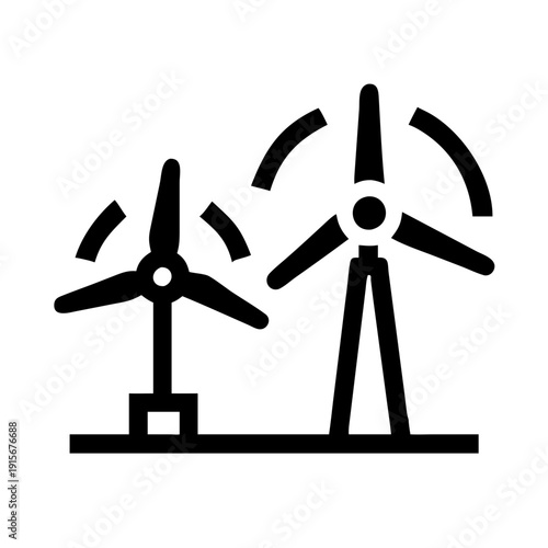Two modern wind turbines generating clean and renewable energy in a field