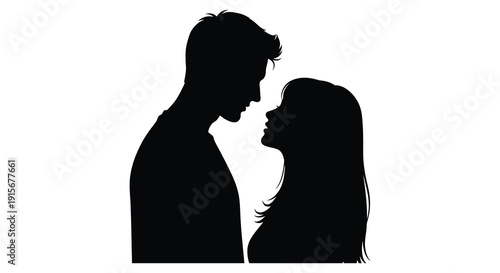 A striking silhouette depicts a couple facing each other suggesting intimacy connection and a romantic moment high quality