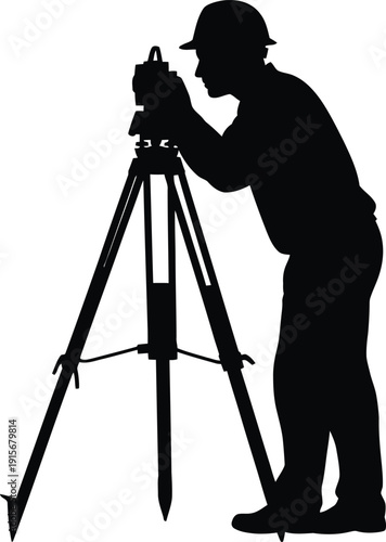 Surveyor using a theodolite on a tripod, measuring land, construction site.