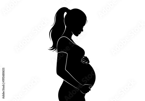 Silhouette of a pregnant woman in profile gently cradling her baby bump high quality professional detailed