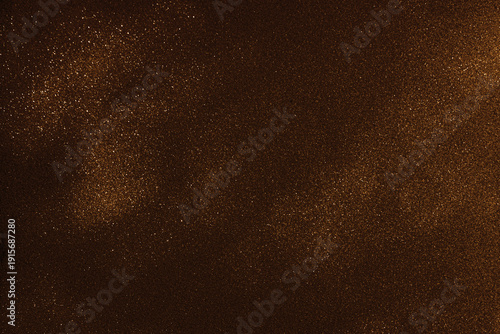 Brown glitter light sparkle texture background. Starry night sky. Glowing stars in the space. Galaxy background. New Year, Christmas and Celebration backdrop concept.