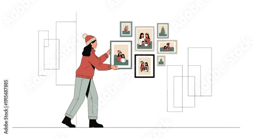 Decorating A Wall With Framed Family Memories During Winter Season