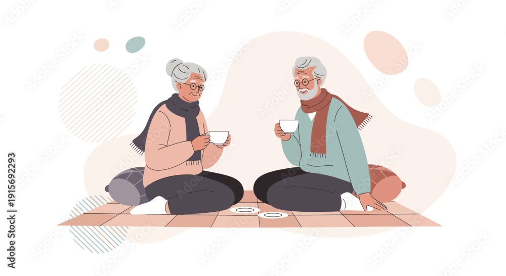 Obraz premium Elderly Couple Enjoying Cozy Beverage Together on Floor