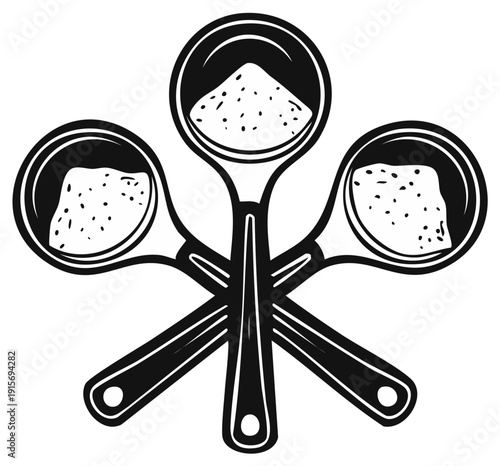 Three crossed spoons filled with granular ingredients or sugar creating a rustic symbol