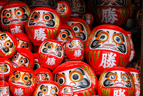 Symbol of determination, good luck charm in Japanese, Many traditional red Daruma doll at Katsuo-ji temple, Osaka, Japan.