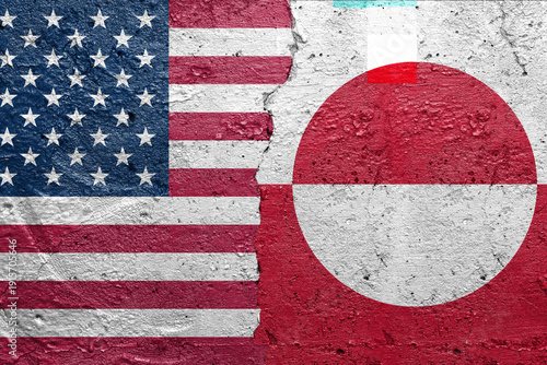 United States of America vs Greenland - Cracked concrete wall painted with a USA flag on the left and a Greenland flag on the right stock photo
