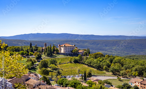 Chateau d'Aiguines and a church on a hill, Alpes-de-Haute-Provence, France, Europe.