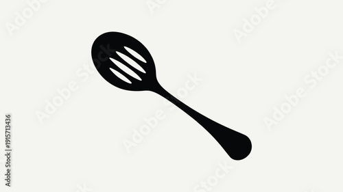 Modern black slotted spoon on white background for cooking and serving
